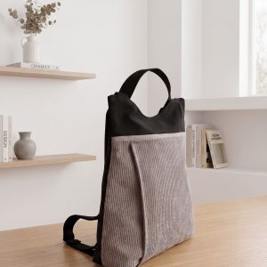 GINA es una mochila Antirrobo Convertible: Seguridad y Estilo Urbano Esta prenda es la combinación perfecta entre una bolsa de hombro elegante y una mochila de seguridad. Diseñada para el día a día en la ciudad, su sistema de asas te permite cambiar de modo de transporte de forma inmediata: utiliza el asa corta para llevarla bajo el brazo o las asas regulables para la máxima comodidad como mochila.